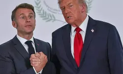 Trump ve Macron’un ilginç tokalaşması dünya basınında